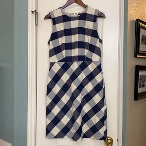 Adorable creme and navy plaid dress. Prefect for fall!